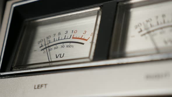 Close-up of analog VU meter scale 4K 2160p 30fps UltraHD footage - Standard volume level indicator s