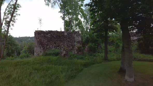 Medieval Castle Ruins in Latvia Rauna. Aerial View Over Old Stoune Brick Wall of Raunas Castle 