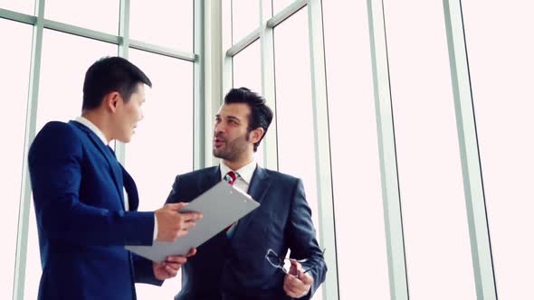 Business People Handshake with Friend at Office