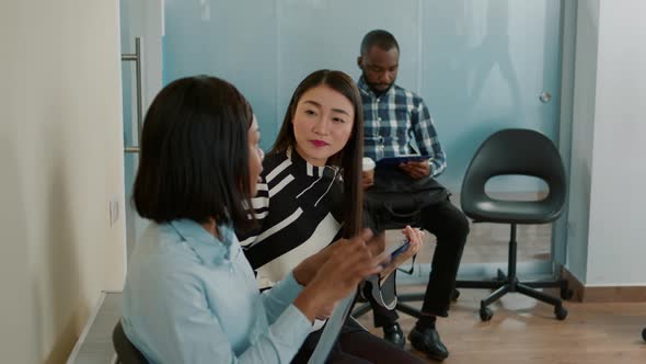 Multiethnic Group of Work Candidates Having Conversation and Waiting