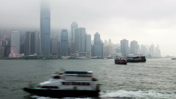 Hong Kong Victoria Harbour Skyline Urban Panorama TimeLapse Pan Up