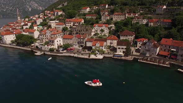 Boat is Moored at the Perast Embankment