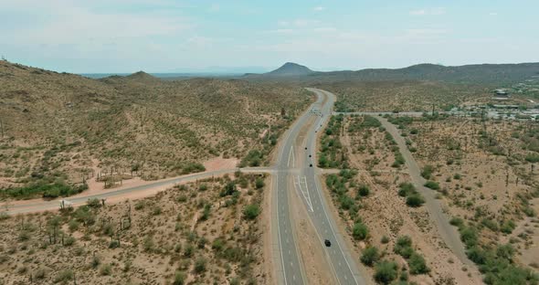 Panoramic view a trip at high speed through the Arizona desert to the distant mountains