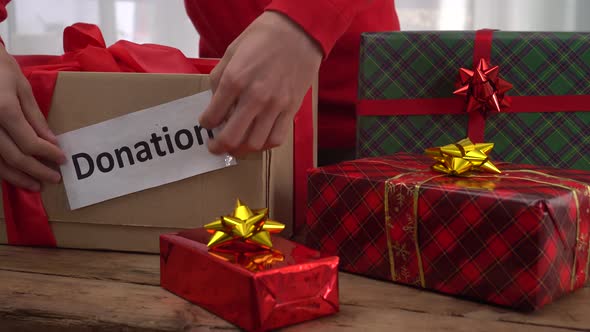 Charitable Christmas Gifts. Donation box, donate, fundraising. Charity that Help Low-Income Families