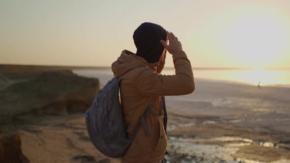 Side View Middle Aged Man Traveler Looking at Sea Beach on Sunrise