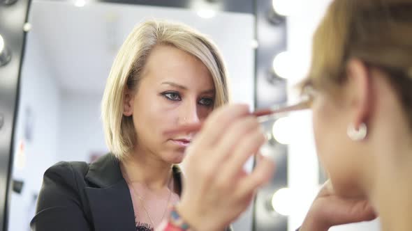 Makeup Artist Applying Makeup