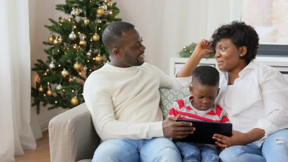 African Family with Tablet Pc on Christmas