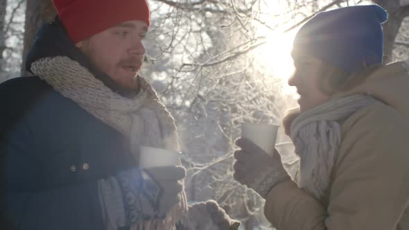 Couple Camping in Winter