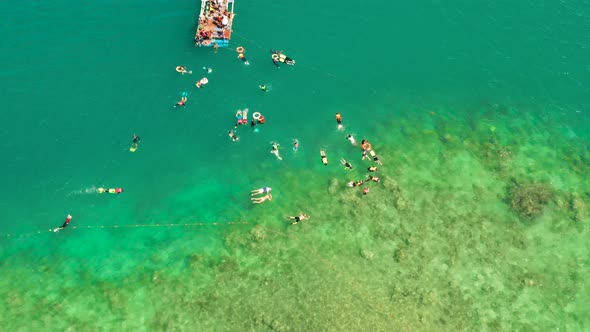 Tourists Snorkeling in the Lagoon, Philippines, El Nido