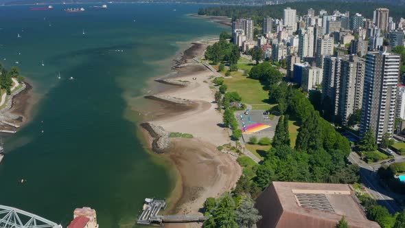 Aerial View Of Sunset Beach And Bayside Park Along Waterfront Buildings Near Burrard Bridge In Canad