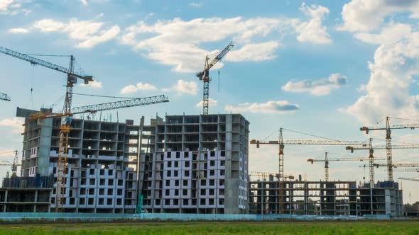 Time Lapse Footage of a Big Construction Site with Several Working Cranes