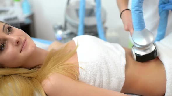 Beautiful Woman Getting Cavitation Treatment