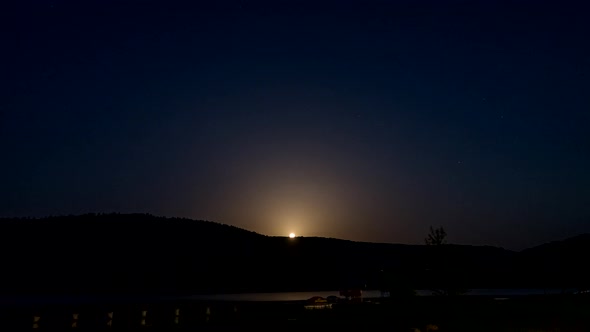 Moon Rising Above Lake