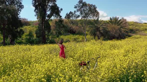 A Young Woman Came on a Bicycle To Nature and Enjoys the Beauty Around