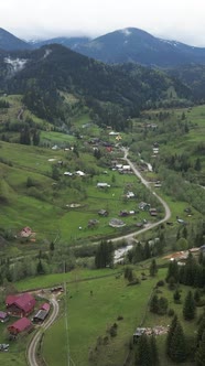 Vertical Video Village in the Carpathian Mountains in Autumn