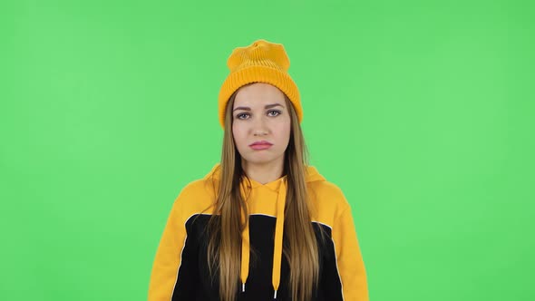 Portrait of Modern Girl in Yellow Hat Is Tired