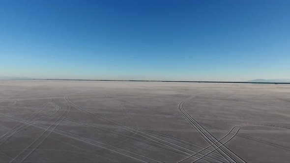 Flying over the Bonneville Salt Flats in Northwestern Utah reveal tire tracks in the soft salt.