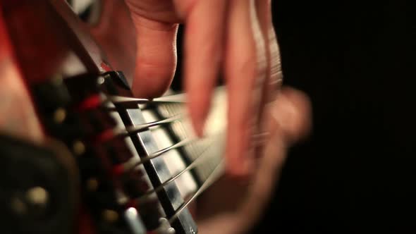 Bass player close up studio shot