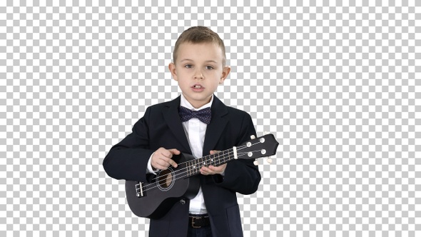 Boy in a costume walking and playing ukulele, Alpha Channel