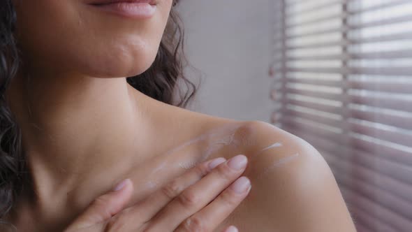 Closeup Shot Unrecognizable Sensual Sexy Young Hispanic Woman Applying Respect Cream on Bare