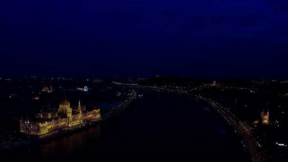 Aerial Wide View of Danube River and Budapest City Skyline at Night Time