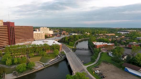 An aerial drone shot captures images of the Flint River near downtown Flint, Michigan.