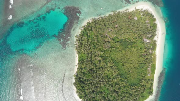 Aerial: flying over tropical island white beach caribbean sea turquoise water co