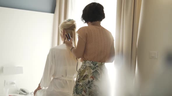 Hair stylist preparing hair