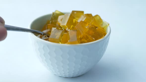 Close Up of Colorful Jelly in a Bowl on White