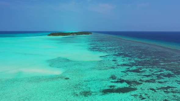 Daytime above abstract view of a paradise sunny white sand beach and blue ocean background in vibran