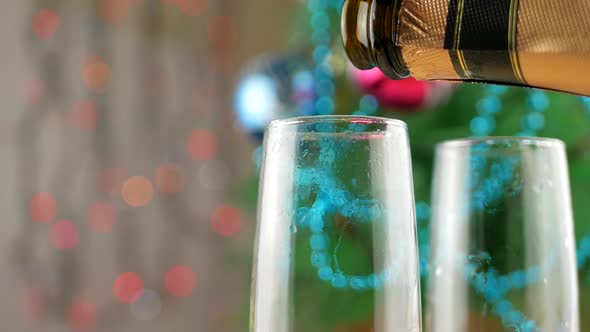 Champagne Pouring and Foaming in Glasses From Bottle