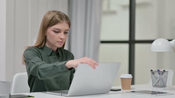 Young Woman Closing Laptop Standing Up Going Away 