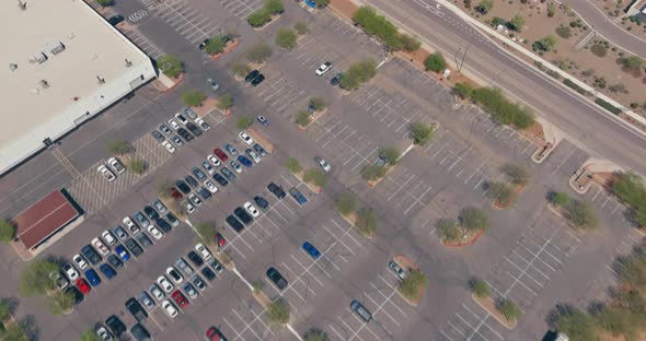 Aerial View of a Large Number Cars Different Brands Standing in a Parking Lot Near the Shopping