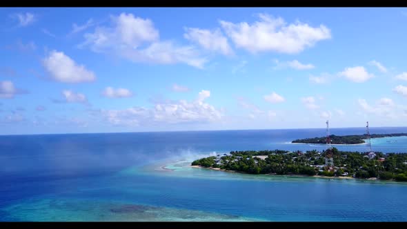 Aerial above landscape of paradise shore beach journey by turquoise ocean with white sand background