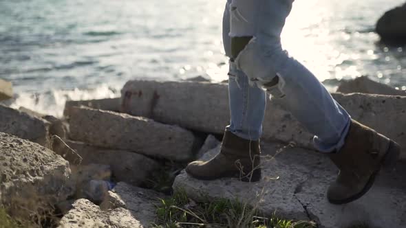 Man Walks on the Beach at Cold Sunny Day Close Up Shot