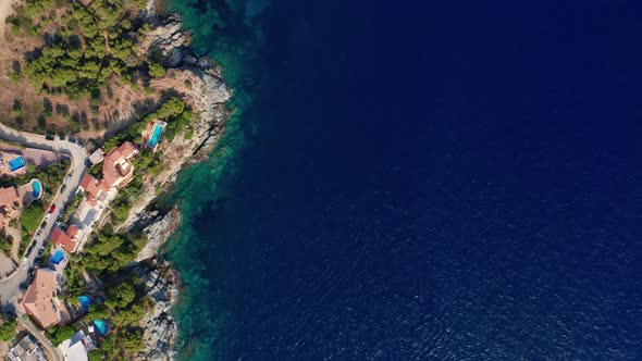 Drone Over Coastline And Buildings Of Cap De Creus