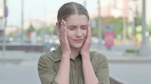 Portrait of Disappointed Woman Reacting to Loss Outdoor