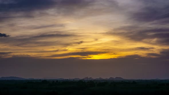 View of Colorful dramatic sky sunset or sunrise with Moving clouds background alt
