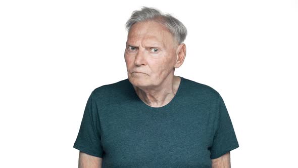 Portrait of Determined and Strict Old Aged Man 80s Having Gray Hair in Basic Tshirt Shaking Head and