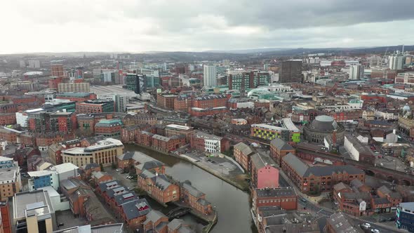 Aerial footage of the area in the Leeds City Centre known as Brewery Wharf in the UK