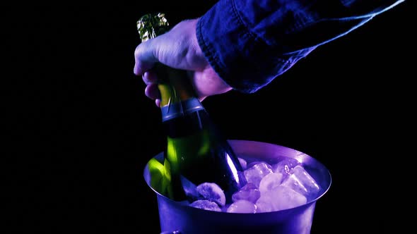 Champagne Taken From Ice At Party