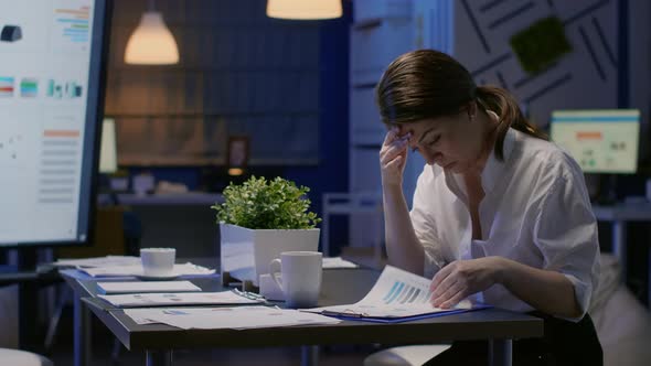 Entrepreneur Woman Hardworking in Office Meeting Room Analyzing Company Documents