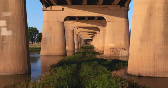 Establishing aerial shot under the Ronald Kirk Bridge near downtown Dallas