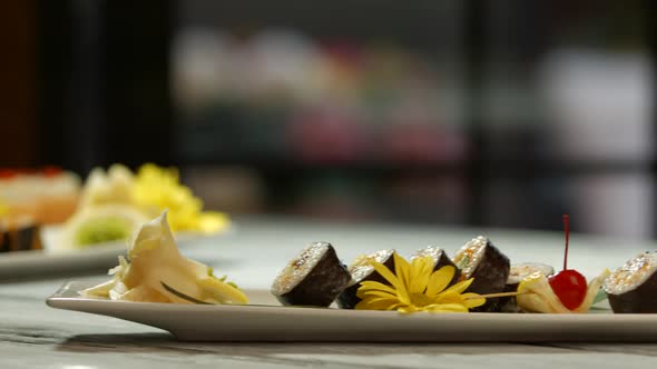 Sushi on Long White Plate.