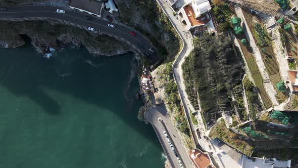 Aerial view of vehicles driving on the Amalfi drive, Salerno, Italy.