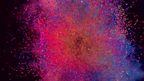 Colored particles fly after being exploded, Slow Motion