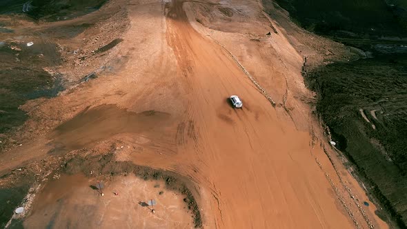 Car is Passing Through a Muddy Pond of Water