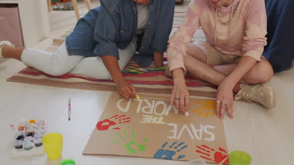 Eco Activists High-fiving in Bedroom