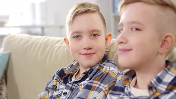 10-Year-Old Caucasian Twins Looking Sideways at Camera alt