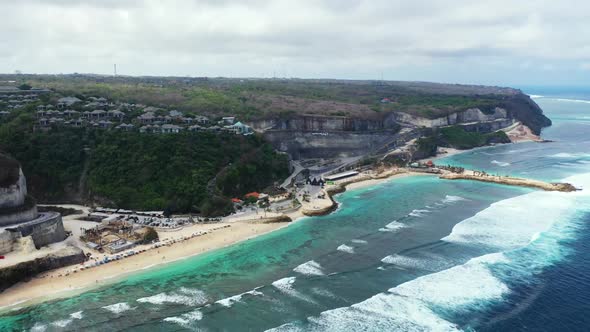 Aerial drone view travel of beautiful coastline beach vacation by blue green sea and white sand back